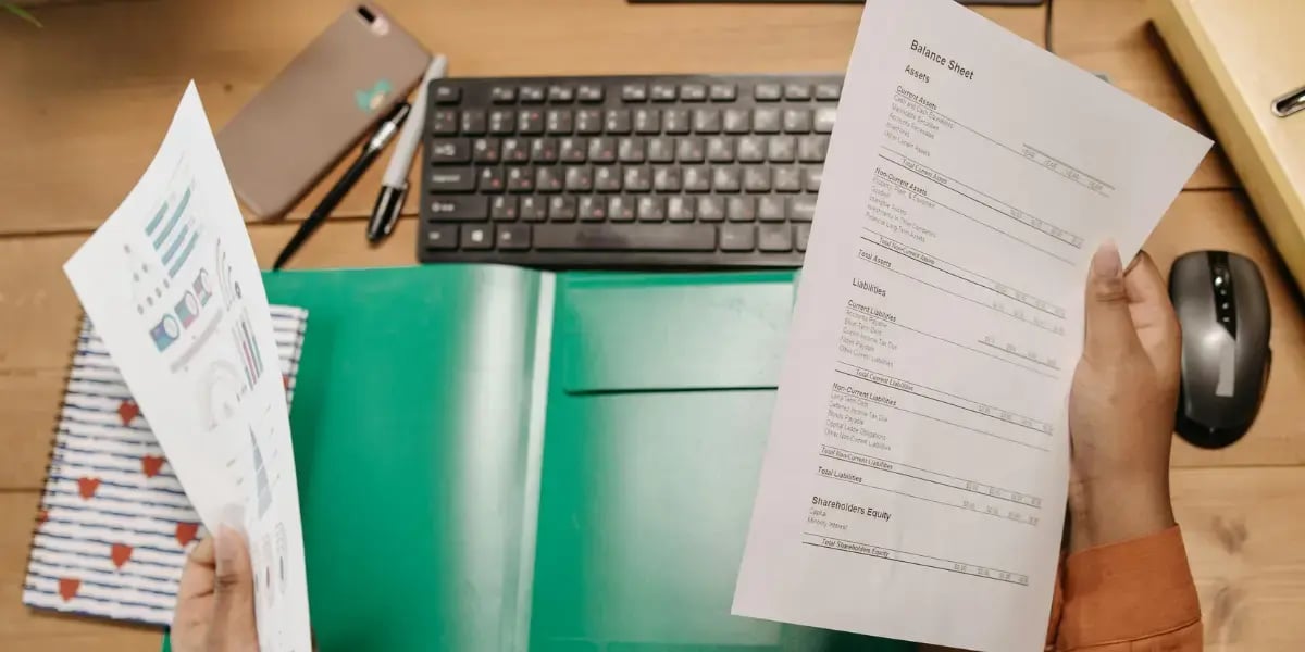 employee reviewing financial statements