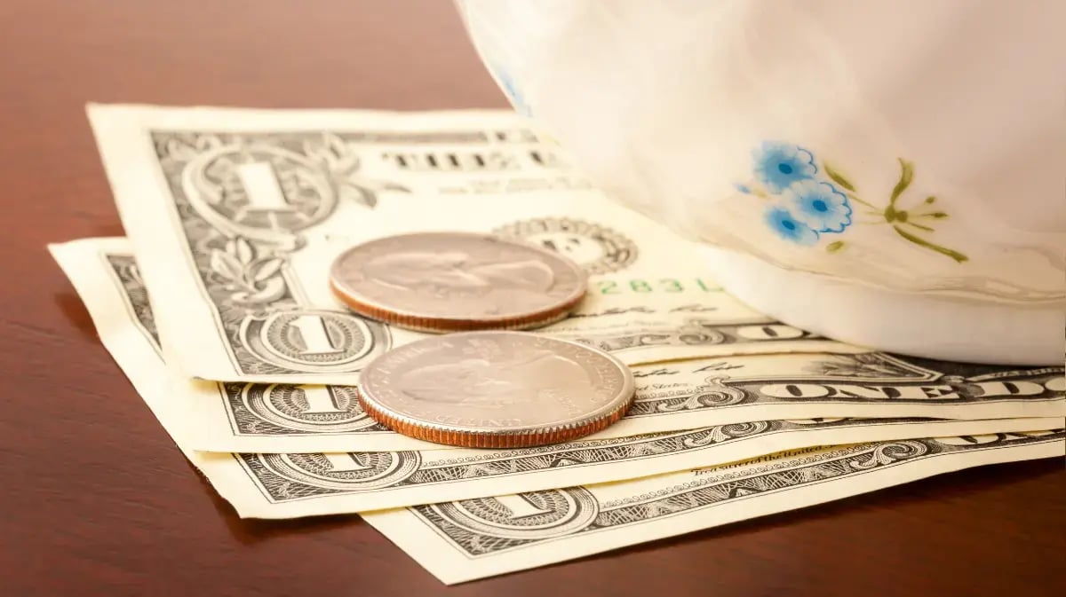 cash and coins on table