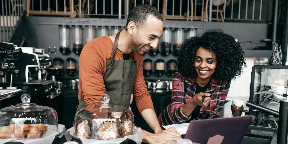 small business owners at their computer together