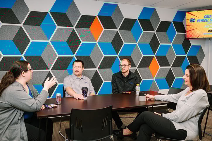 employees-in-kitchen-seated